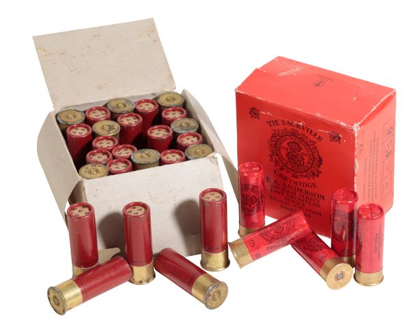 A BOX OF 25 X 12 BORE PAPER CARTRIDGES