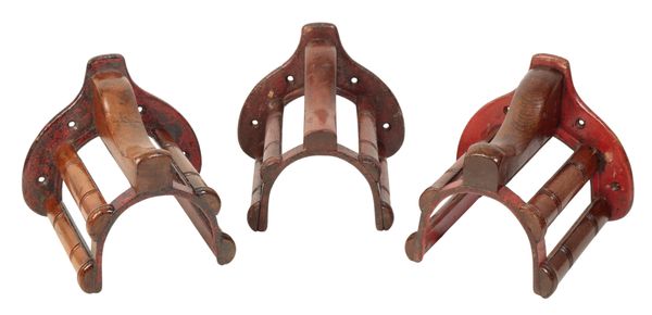 MUSGRAVE OF BELFAST AND LONDON: A SET OF THREE CAST IRON AND WOODEN HARNESS RACKS