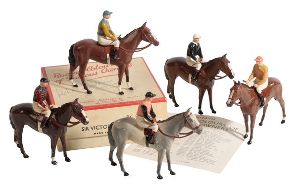 A BRITAINS LEAD PAINTED RACING SET