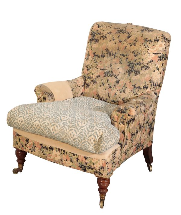 A HOWARD & SONS ARMCHAIR