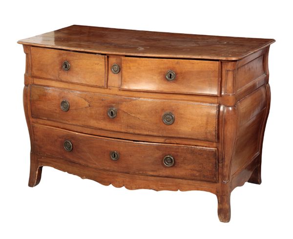 A CONTINENTAL FRUITWOOD BOMBE COMMODE