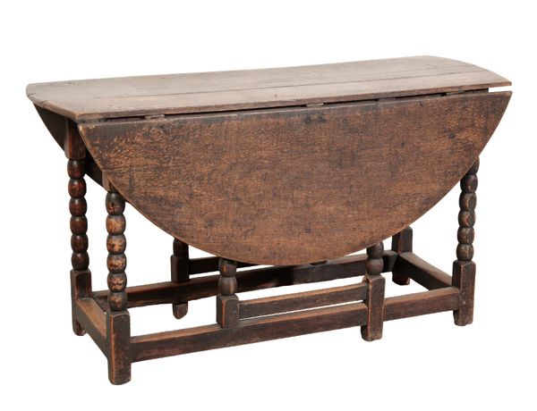 A 17TH CENTURY OAK GATELEG TABLE