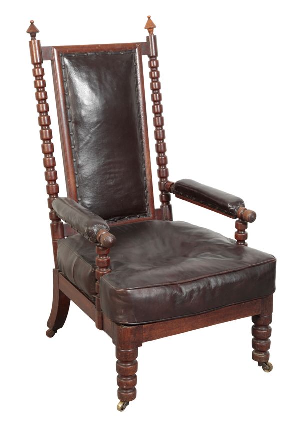 A VICTORIAN GOTHIC OAK ARMCHAIR