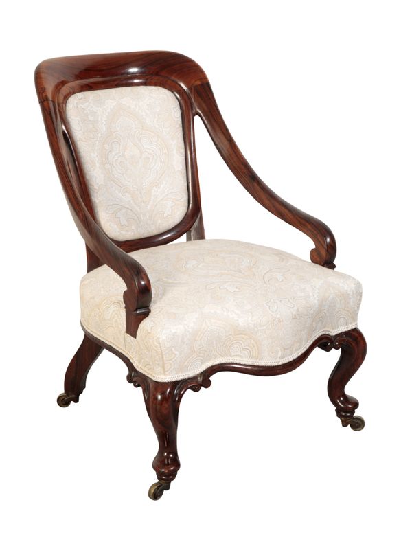 A VICTORIAN ROSEWOOD ARMCHAIR