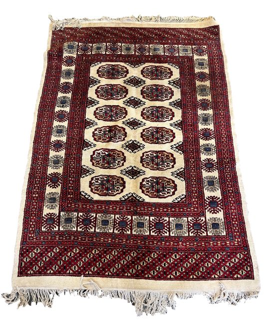 A CAUCASIAN WOOL RUG