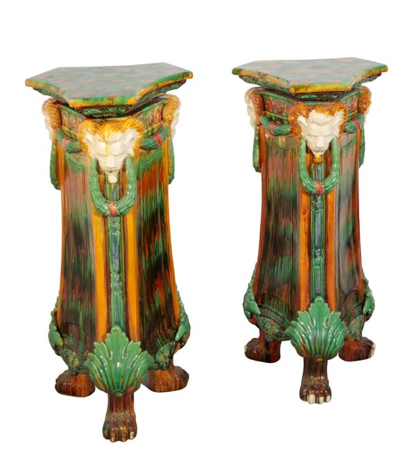 A PAIR OF CHINESE TRIFORM SANCAI GLAZE PILLARS