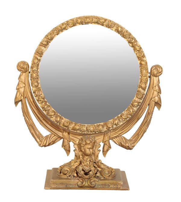 A GILTWOOD AND COMPOSITION DRESSING MIRROR