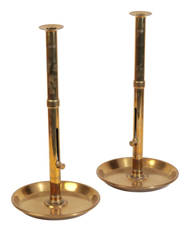 A PAIR OF 19TH CENTURY BRASS TELESCOPIC CANDLESTICKS