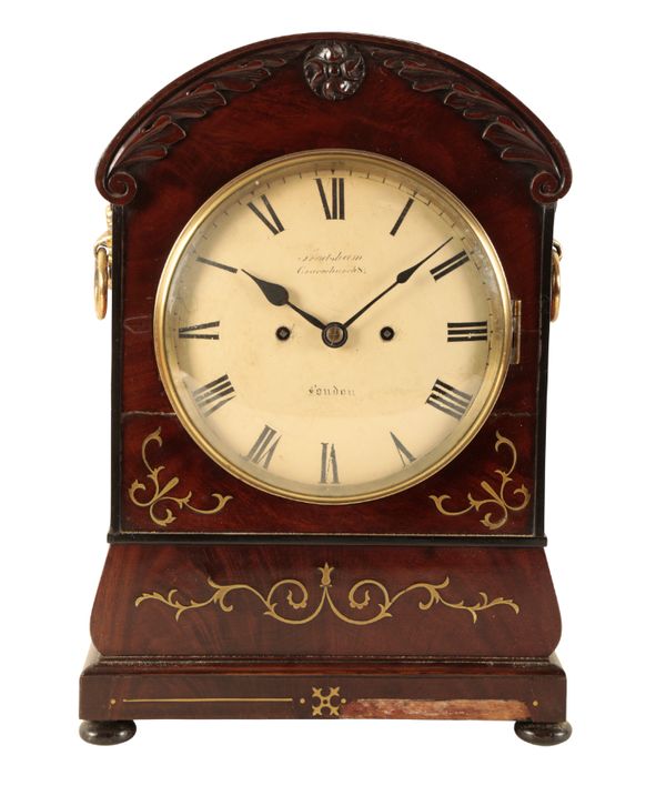 A 19TH CENTURY FLAME MAHOGANY BRACKET CLOCK