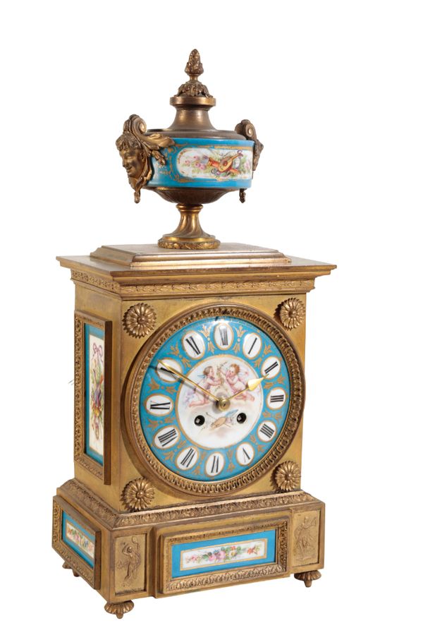 A FRENCH BRASS CASED MANTLE CLOCK WITH SEVRE STYLE PORCELAIN PANELS