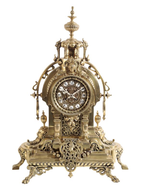 A FRENCH BRASS CASED MANTLE CLOCK