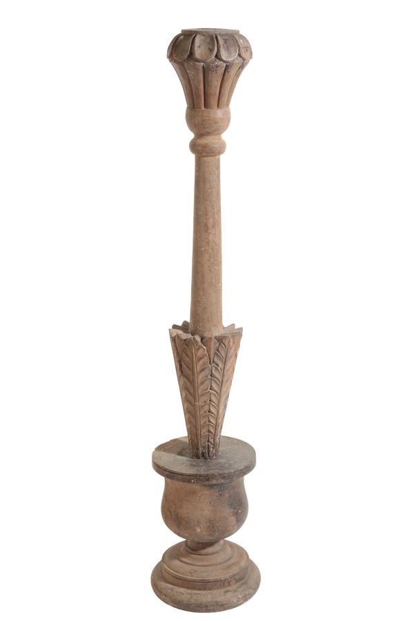 AN ECCLESIASTICAL OAK CANDLESTICK