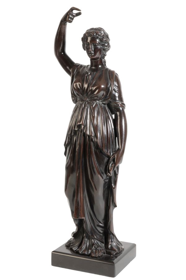 A BRONZE FIGURE OF A CLASSICAL ROMAN FEMALE