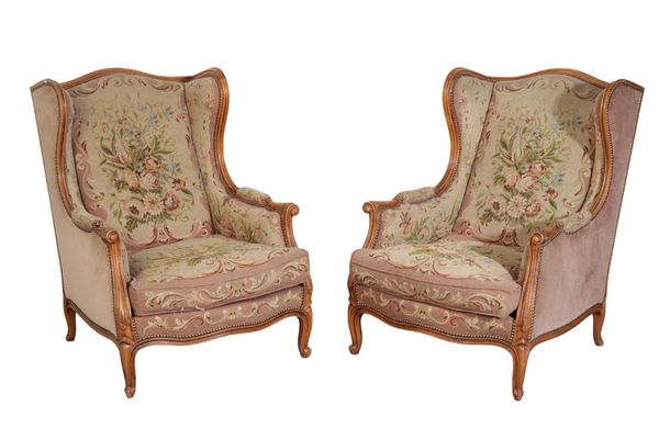 A PAIR OF CARVED BEECH ARMCHAIRS