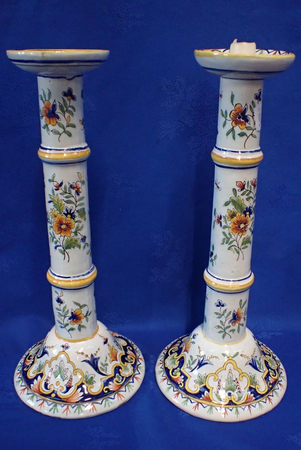 A PAIR OF LARGE ROUEN STYLE FAIENCE CANDLESTICKS