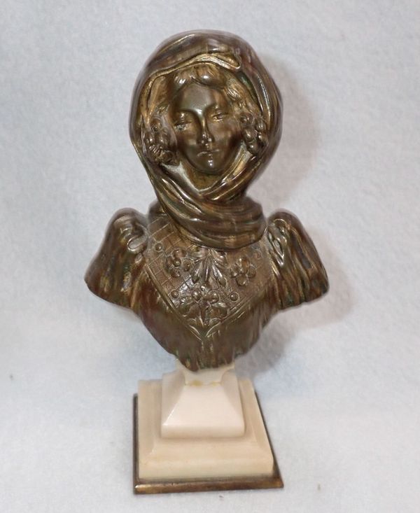 LATE 19th CENTURY GILDED BRONZE OF A WELL DRESSED YOUNG GIRL