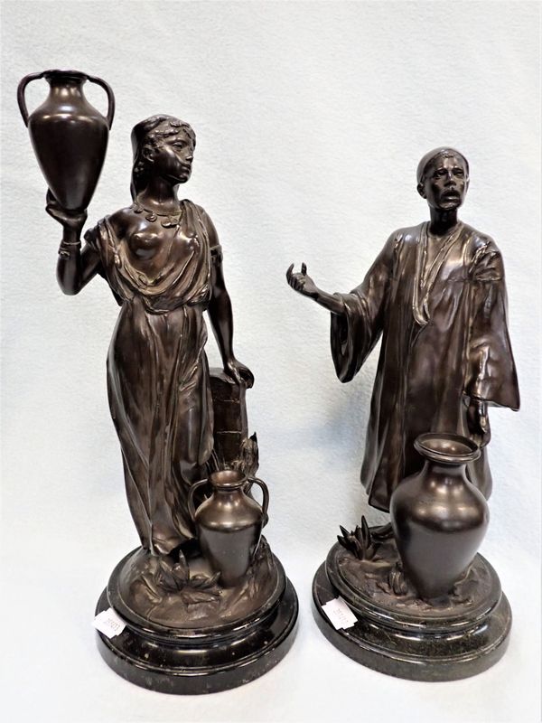 PAIR OF BRONZED SPELTER FIGURES OF MIDDLE EASTERN WATER CARRIERS