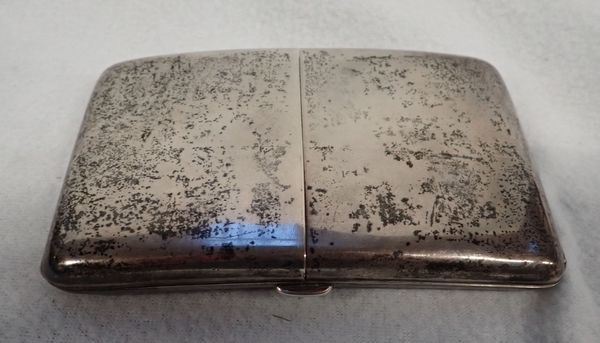 A SILVER CIGARETTE CASE