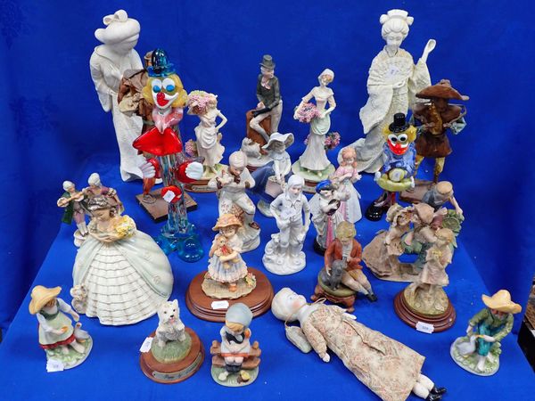A COLLECTION OF FIGURINES