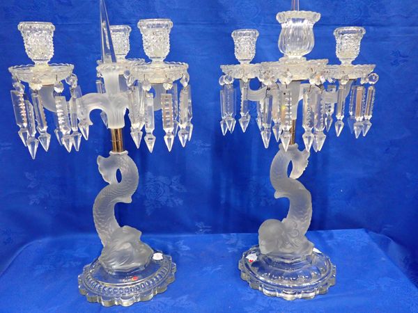 A NEAR PAIR OF CUT, MOULDED AND FROSTED GLASS CANDELABRA