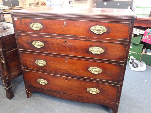 A REGENCY STYLE MAHOGANY CHEST OF DRAWERS