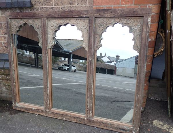 AN ANGLO-INDIAN CARVED WOOD TRIPTYCH MIRROR