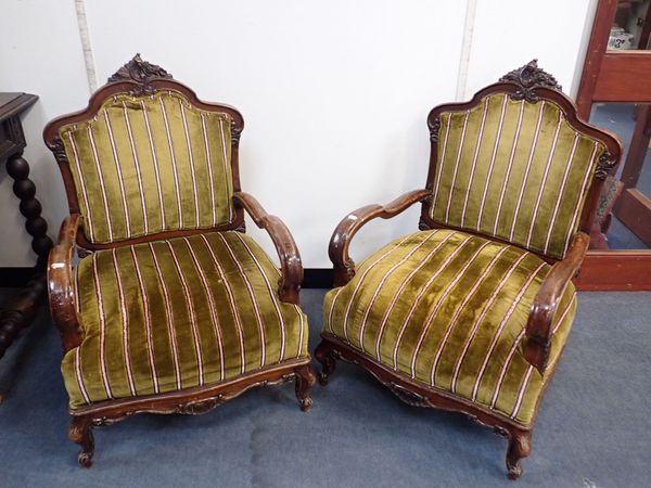 A PAIR OF FRENCH STAINED BEECH FRAMED ARMCHAIRS