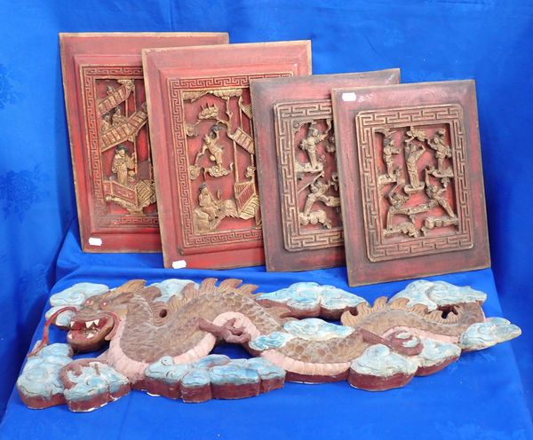 A SET OF FOUR RED-PAINTED AND PARCEL GILT CHINESE PANELS