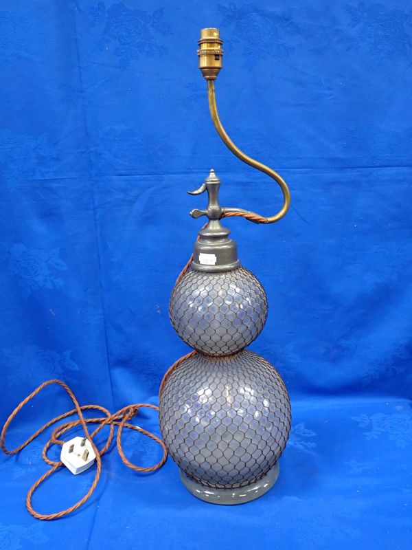 A DOUBLE-GOURD FORM SELTZOGENE SYPHON CONVERTED TO A TABLE LAMP