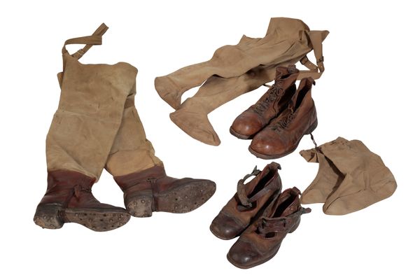 A PAIR OF EDWARDIAN LEATHER AND CANVAS LADY'S AND GENTLEMANS' WADERS