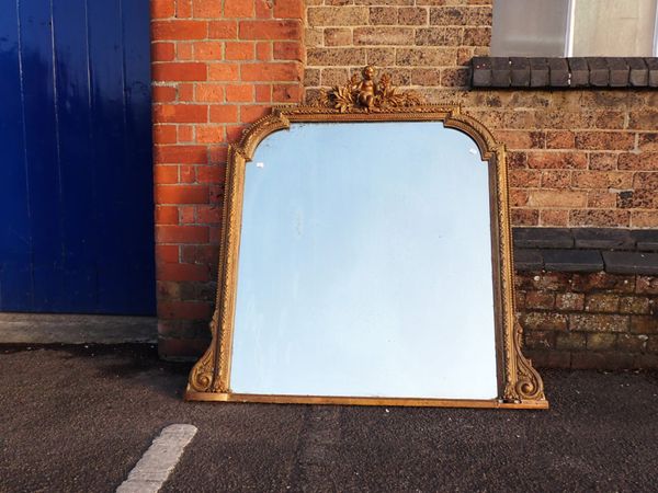 A VICTORIAN MOULDED AND GILT OVERMANTEL MIRROR