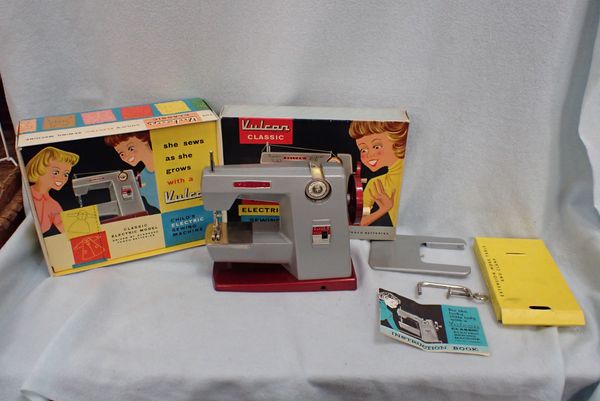 A 'VULCAN CLASSIC' CHILD'S  SEWING MACHINE