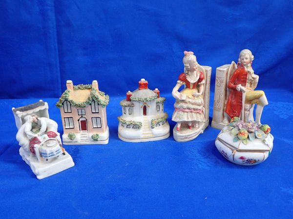 A STAFFORDSHIRE COTTAGE MONEY BOX AND A SIMILAR PASTILLE BURNER