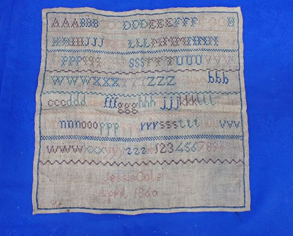 A 19TH CENTURY NEEDLEWORK SAMPLER; 'JESSIE COLE, APRIL 1860'