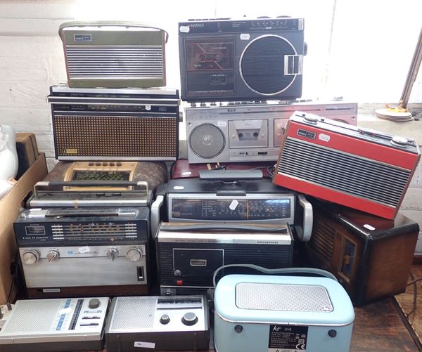 A COLLECTION OF RETRO RADIOS AND TAPE PLAYERS