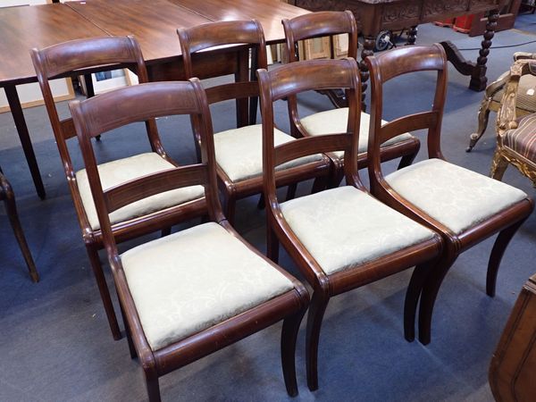 A SET OF SIX 19TH CENTURY MAHOGANY DINING CHAIRS, WITH TAPERING SCROLL-OVER BACKS