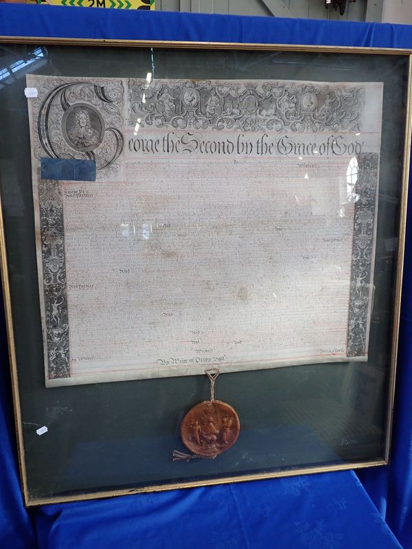 A GEORGE II PARCHMENT DOCUMENT, WITH ENGRAVED BORDERS AND PENDANT WAX SEAL