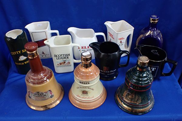 A COLLECTION OF PUB WATER JUGS, WADE AND OTHERS