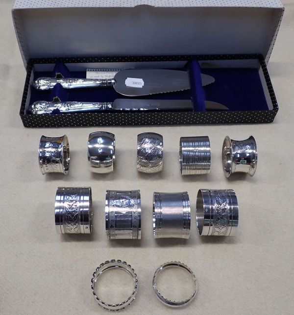 A COLLECTION OF 11 SILVER NAPKIN RINGS