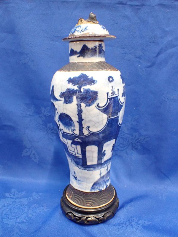 A CHINESE BLUE AND WHITE CRACKLE-GLAZE  VASE AND COVER