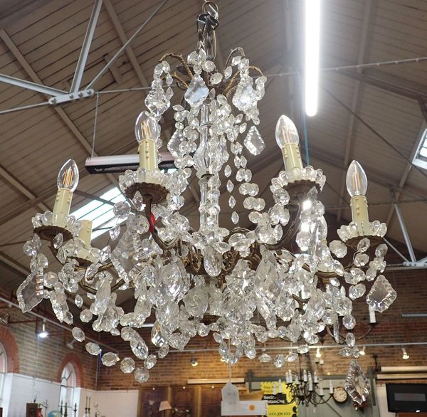 A GILT METAL AND CUT-GLASS CHANDELIER