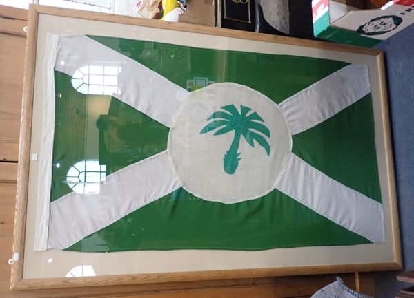 A FRAMED EXAMPLE OF THE PALM LINE LTD. FLAG