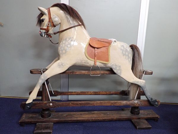 A 'SAFETY' ROCKING HORSE, POSSIBLY BY W. WILSON & SONS (SILVER CROSS) CIRCA 1920