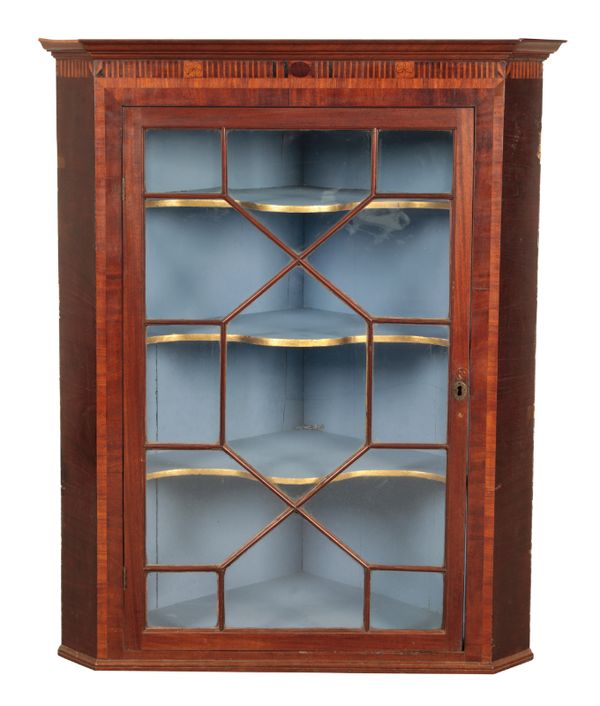 A GEORGE III MAHOGANY HANGING CORNER CABINET