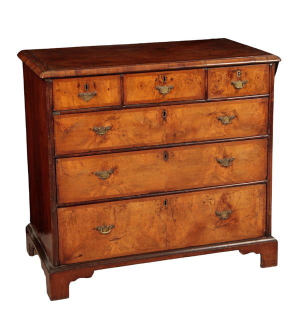 A GEORGE I WALNUT CHEST OF DRAWERS