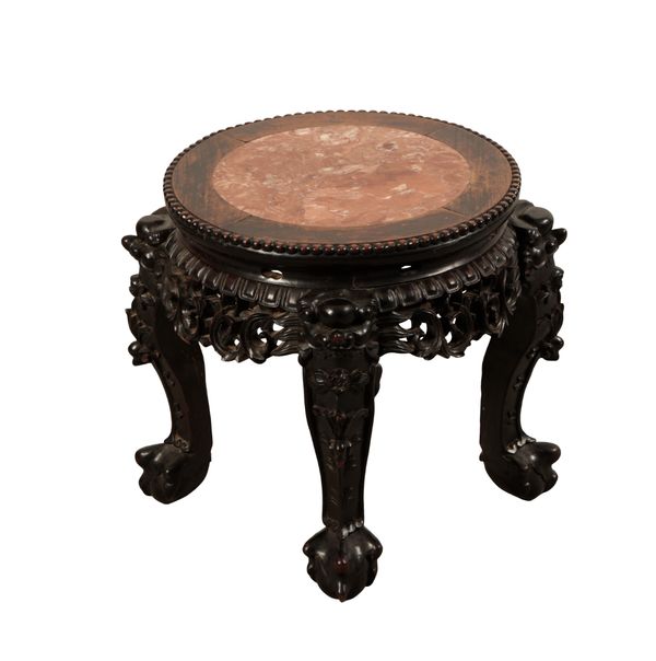 AN ORIENTAL EBONISED AND MARBLE TOPPED JARDINIERE STAND