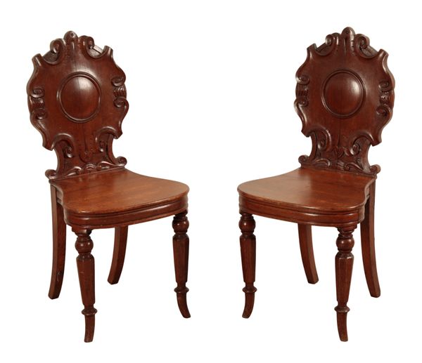 A PAIR OF VICTORIAN OAK HALL CHAIRS