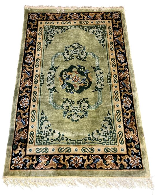 A CHINESE SILK RUG