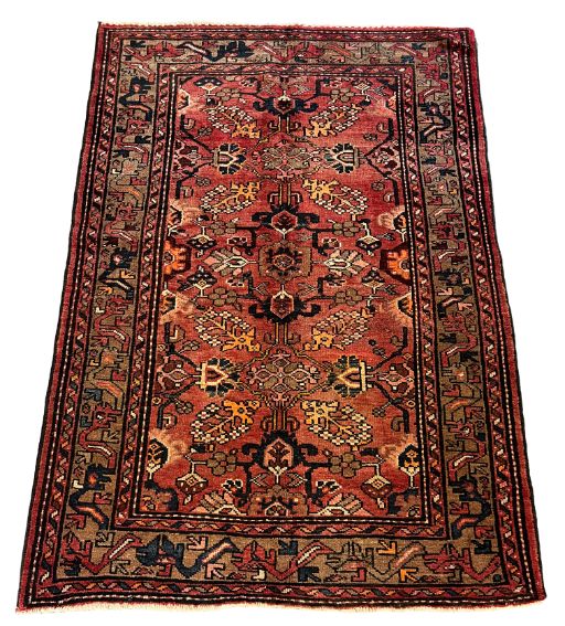 A NORTH WEST PERSIAN HERIZ RUG