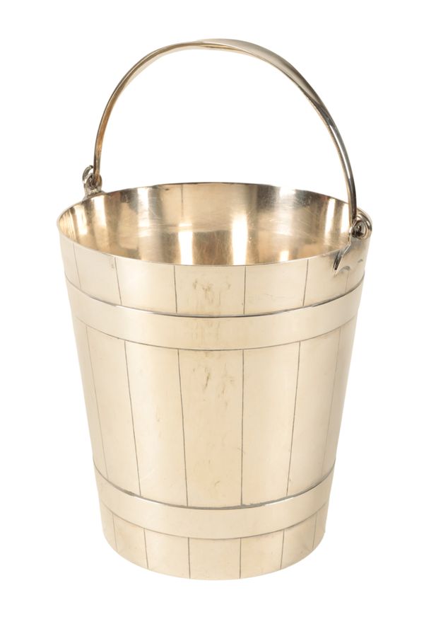 A SILVER-PLATED ICE BUCKET